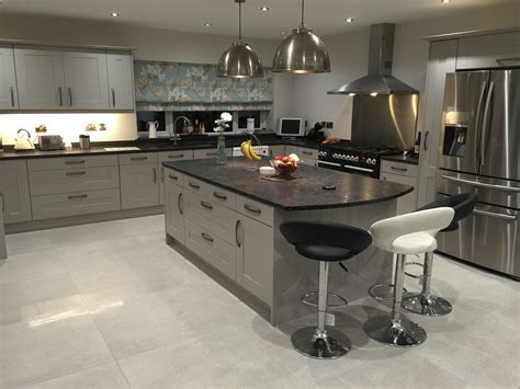 best cabinet color with steel gray lethered granite|grey granite cabinets pairing.